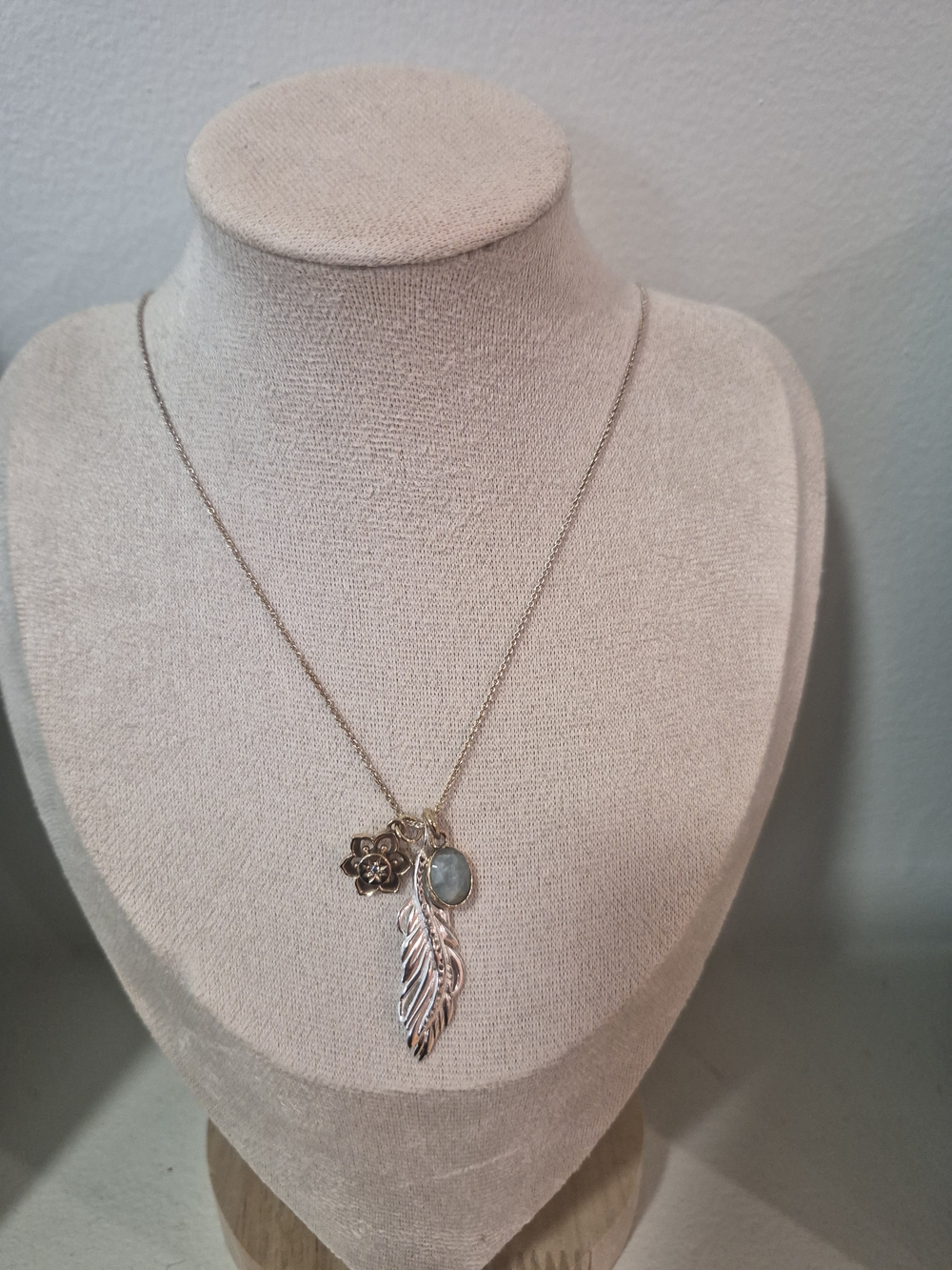 Stella & Dot Silver-Tone Feather, Flower & Pale Blue Stone Necklace